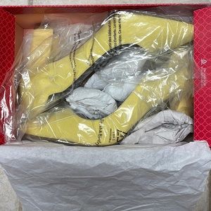 Brand new, never worn lemon pumps